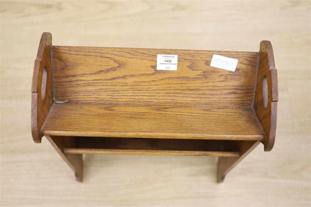 An early 20th century oak book/paper stand, height 60cm